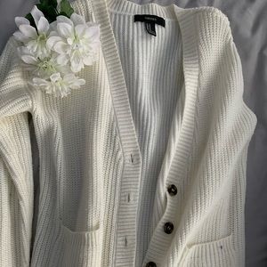 White cardigan with tortoiseshell buttons